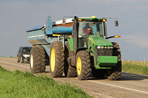 Get tips and more information about driving behind large farm equipment in our Texas Neighbors publication.